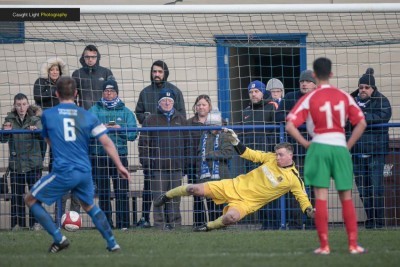 Harrogate goalkeeper Tom Goodwin is beaten by the penalty which put the game beyond Railway. Picture: Caught Light Photography