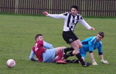 Emley stop a Westella attack