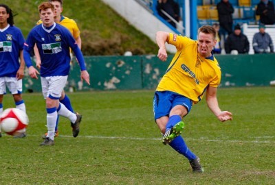 Rory Coleman scores from the penalty spot during Stocksbridge's 3-0 win over Leek Town. Picture: Peter Revitt