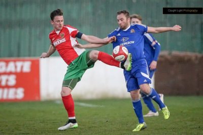 Harrogate Railway captain Dan Thirkell battles for the ball during his side's 2-1 defeat to Ossett Town. Picture: Caught Light Photography