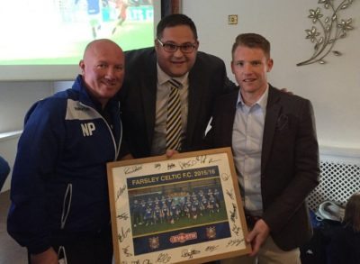 Retiring Farsley captain Robbie O'Brien receives a memento from Neil Parsley and chief executive Josh Greaves