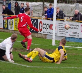 Turning point: Handsworth goalkeeper Archie Sneath was sent off for a challenge on Tom Corner just before Richard Adams scooped the ball off-the-line