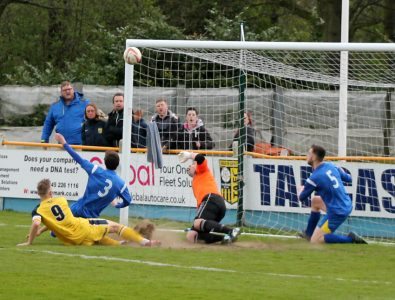 Tom Corner's goal for Tadcaster loops over Garforth goalkeeper Dom Smith. Picture: Keith Handley