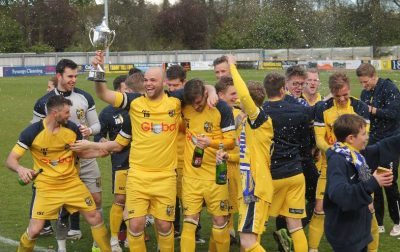Tadcaster captain Jimmy Beadle lifts the NCEL Premier Division trophy. Picture: Keith Handley