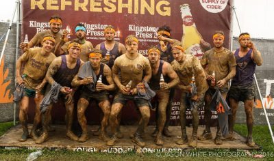 The eleven Maltby Main players and joint manager Spencer Fearn after completing the Tough Mudder