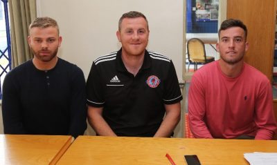 Shaw Lane AFC manager Craig Elliott (centre) with new signings Danny Frost (left) and Kieran Scargill (right). Picture: Gary Frost