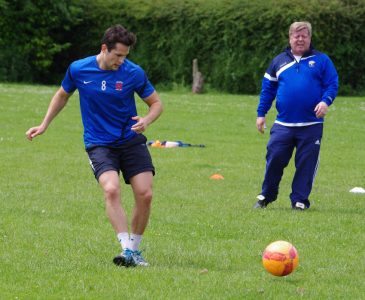 That's my boy. Rob Hunter watches James Beaston play a pass.