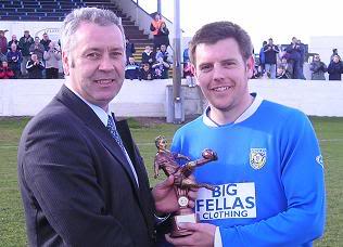 Chris Hilton collects a player of the year award during his time with Frickley