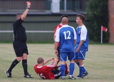 Connor Rollinson looks on in shock as Mark Wilson is shown a red card. Picture: Craig Dinsdale