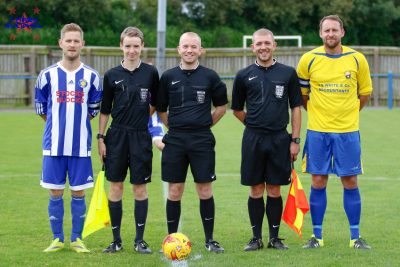 Referee Ricky Taylor, his two assistants and the two captains. Picture: Mark Gledhill