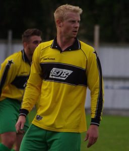 Former Ossett Albion centre-back Andy McManus has signed for Glasshoughton