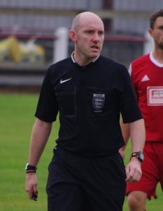Referee James Fox