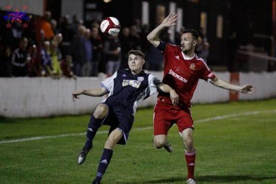 Goole defender Jack McCarthy in battle with Ossett's Alex Petersen. Picture: Mark Gledhill