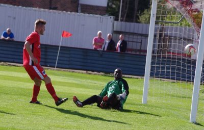 Benn Lewis scores his goal