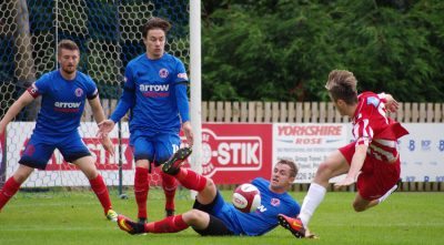 Alex Byrne blocks a shot