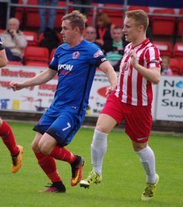 Alex Byrne (left) earned a point for Shaw Lane at AFC Rushden & Diamonds