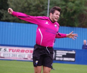 James Beaston wins a header