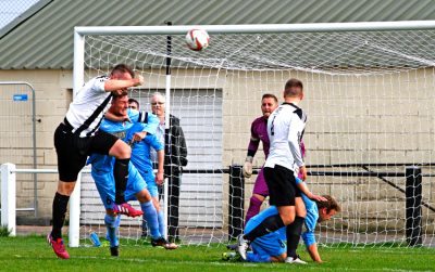 Brett Lovell heads Penistone in front. Picture: Ian Revitt