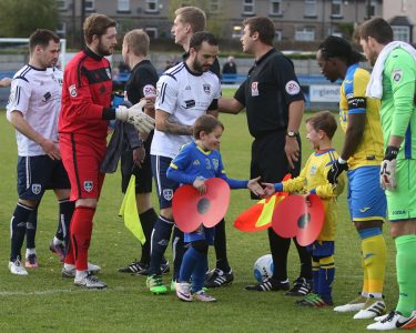 The handshakes before Guiseley's 2-0 win over Torquay. Picture: alexdaniel.co.uk